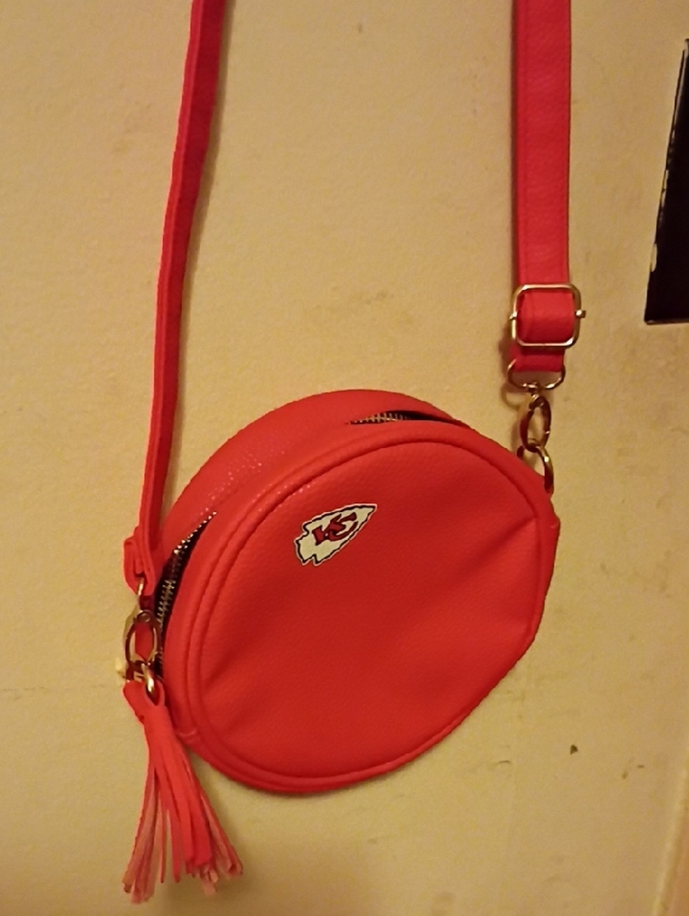 NFL Kansas City Chiefs Coral Crossbody Bag with Tassel